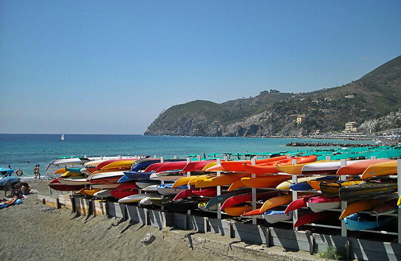 View of colorful canoes and the sea in Lerici