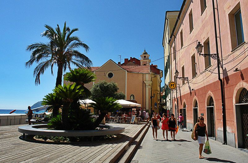 Lovely old town of Alassio in Liguria with palm trees