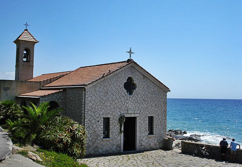 A small church in Bordighera directly by the sea