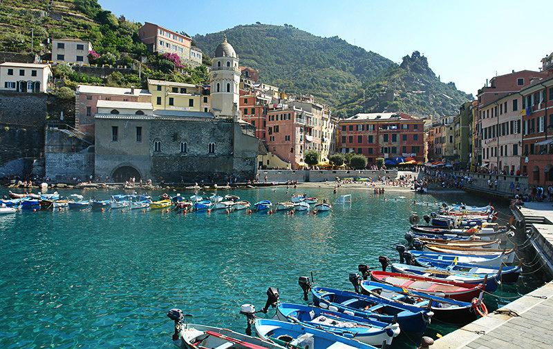 A beautiful view of Vernazza and its port in Cinque Terre