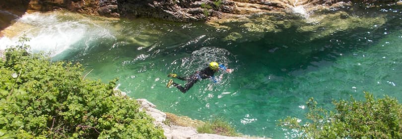 A man is canyoning in Liguria